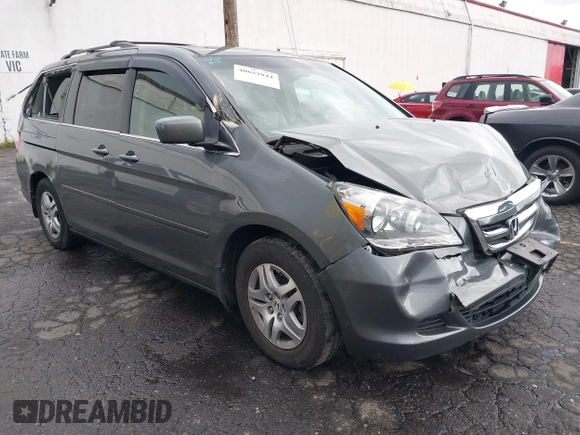 2007 Honda Odyssey EX-L z VIN 5FNRL386X7B445642, wystawiony jako IAAI lot #40652844 z przebiegiem 202 622 mil mil oraz . Historia ofert i sprzedaży dostępna na DreamBid. Obrazek 1.