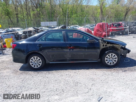 2014 Toyota Camry L with VIN 4T4BF1FK9ER408973, listed as a IAAI auction lot 42074491 with 183,934 mi miles and . Bid and sale history available at DreamBid. Image 13.