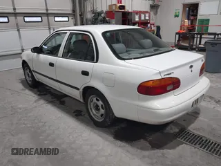 2000 Chevrolet Prizm LSi z VIN 1Y1SK528XYZ430060, wystawiony jako IAAI lot #41173059 z przebiegiem 96 086 mil mil oraz . Historia ofert i sprzedaży dostępna na DreamBid. Obrazek 3.