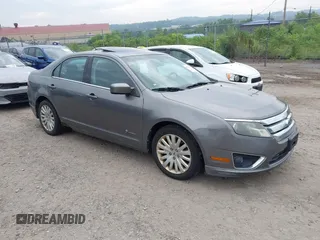 2010 Ford Fusion Hybrid with VIN 3FADP0L34AR102024, listed as a IAAI auction lot 42704729 with 161,000 mi miles and . Bid and sale history available at DreamBid. Image 1.
