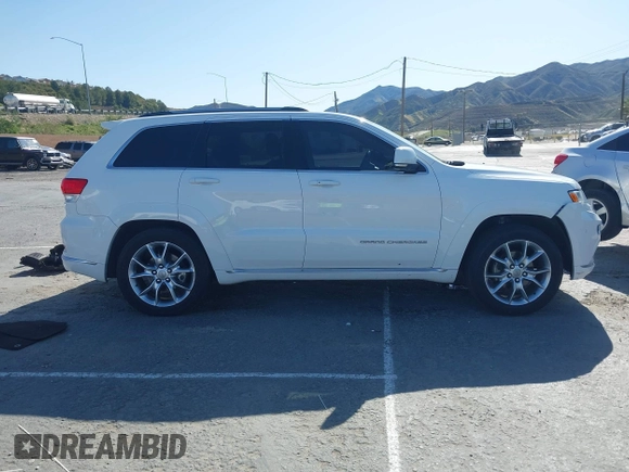 2016 Jeep Grand Cherokee with VIN 1C4RJEJM8GC321506, listed as a IAAI auction lot 41969587 with 226,072 mi miles and . Bid and sale history available at DreamBid. Image 14.