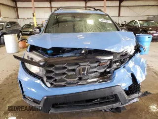 2024 Honda Passport TrailSport z VIN 5FNYF8H61RB013217, wystawiony jako Copart lot #52349015 z przebiegiem 8 360 mil mil oraz Szkoda całkowita • Salvage title. Historia ofert i sprzedaży dostępna na DreamBid. Obrazek 5.
