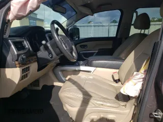 2017 Nissan Titan XD SL with VIN 1N6BA1F44HN510174, listed as a Copart auction lot 63245694 with 121,868 mi miles and Salvage Title. Bid and sale history available at carsss.com. Image 7.