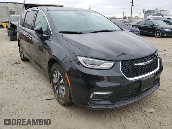 2023 Chrysler Pacifica Hybrid Touring L with VIN 2C4RC1L78PR541746, listed as a Copart auction lot 54633865 with 5,291 mi miles and Non repairable. Bid and sale history available at DreamBid. Image 4.