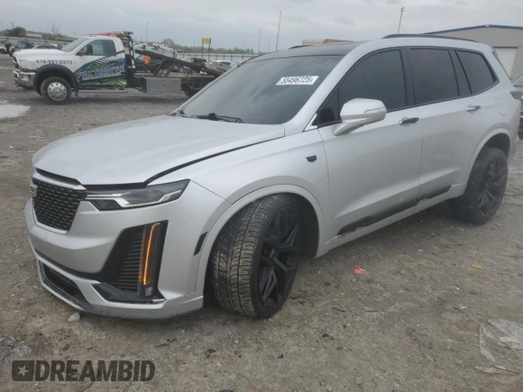 2020 Cadillac XT6 FWD Premium Luxury with VIN 1GYKPCRS8LZ112792, listed as a Copart auction lot 55496725 with 53,571 mi miles and Salvage title. Bid and sale history available at DreamBid. Image 1.
