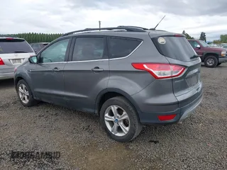 2013 Ford Escape SE with VIN 1FMCU9GX4DUB84247, listed as a IAAI auction lot 40427032 with 201,151 mi miles. Bid and sale history available at carsss.com. Image 3.