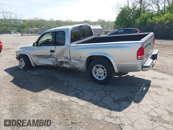 2001 Dodge Dakota SLT with VIN 1B7GG22XX1S348751, listed as a IAAI auction lot 42077395 with 148,034 mi miles and . Bid and sale history available at carsss.com. Image 3.