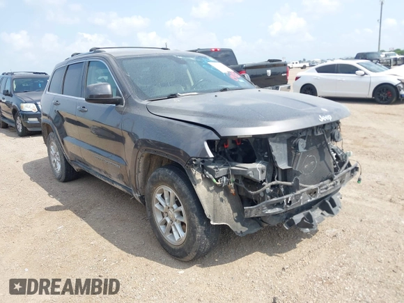 2020 Jeep Grand Cherokee Laredo E with VIN 1C4RJEAG2LC284912, listed as a IAAI auction lot 42114881 with 86,579 mi miles and . Bid and sale history available at DreamBid. Image 1.