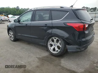 2019 Ford Escape Titanium with VIN 1FMCU0J95KUB14713, listed as a Copart auction lot 55887895 with 85,414 mi miles and Salvage title. Bid and sale history available at DreamBid. Image 2.