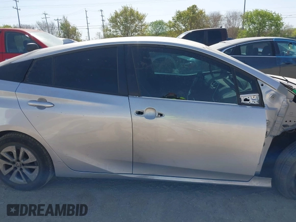 2017 Toyota Prius Two with VIN JTDKARFU9H3037028, listed as a IAAI auction lot 41808283 with 147,617 mi miles. Bid and sale history available at carsss.com. Image 14.