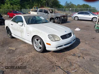 1999 Mercedes-Benz SLK-Class with VIN WDBKK47F1XF086364, listed as a IAAI auction lot 42124466 with 177,104 mi miles. Bid and sale history available at carsss.com. Image 1.