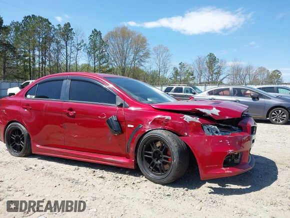 2008 Mitsubishi Lancer Evolution GSR with VIN JA3AW86V38U050561, listed as a IAAI auction lot 41879629 with 104,905 mi miles. Bid and sale history available at carsss.com. Image 6.