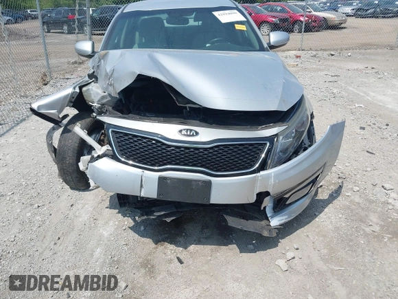 2014 Kia Optima LX with VIN 5XXGM4A76EG316577, listed as a IAAI auction lot 42594090 with 68,979 mi miles and . Bid and sale history available at DreamBid. Image 6.