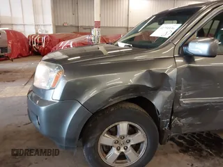 2011 Honda Pilot EX-L with VIN 5FNYF4H65BB020721, listed as a IAAI auction lot 41794436 with 113,630 mi miles and . Bid and sale history available at carsss.com. Image 17.