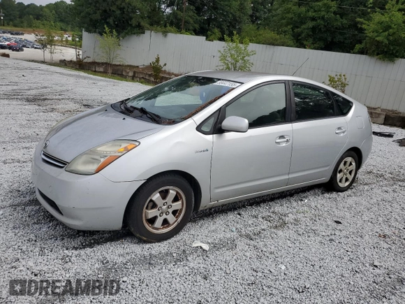 2007 Toyota Prius z VIN JTDKB20U377546391, wystawiony jako Copart lot #58447155 z przebiegiem 215 704 mil mil oraz Czysty tytuł • Clean title. Historia ofert i sprzedaży dostępna na DreamBid. Obrazek 1.