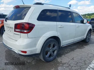 2016 Dodge Journey Crossroad Plus with VIN 3C4PDCGB7GT213827, listed as a IAAI auction lot 42302150 with 128,661 mi miles and . Bid and sale history available at DreamBid. Image 4.