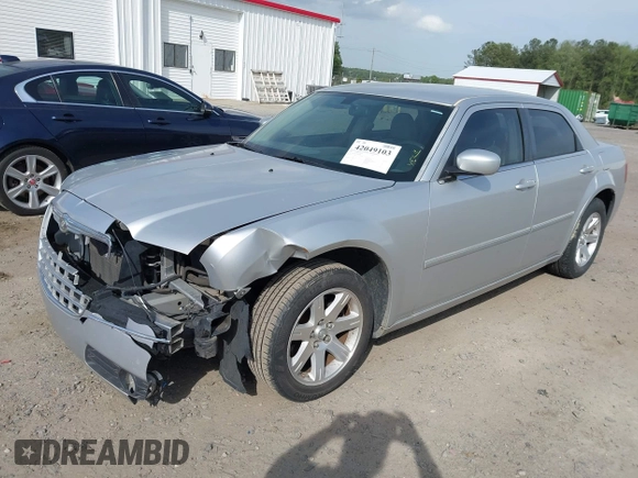 2006 Chrysler 300 Touring with VIN 2C3KA53G26H459048, listed as a IAAI auction lot 42049103 with 256,564 mi miles. Bid and sale history available at carsss.com. Image 2.