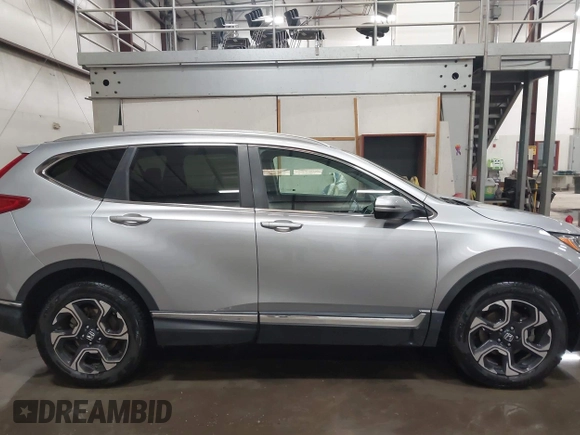 2017 Honda CR-V Touring with VIN 2HKRW2H90HH603307, listed as a IAAI auction lot 41868564 with 81,144 mi miles. Bid and sale history available at carsss.com. Image 13.