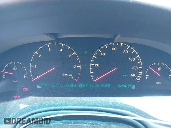 1998 Cadillac Seville STS z VIN 1G6KY5499WU916185, wystawiony jako IAAI lot #42035783 z przebiegiem 164 763 mil mil oraz . Historia ofert i sprzedaży dostępna na DreamBid. Obrazek 7.