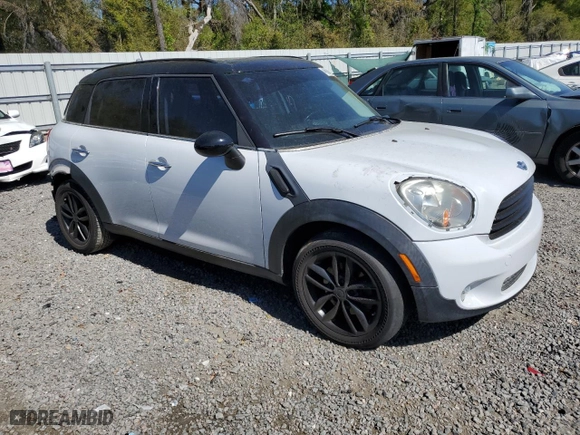 2011 MINI Cooper Countryman with VIN WMWZB3C56BWM00040, listed as a Copart auction lot 48660435 with 146,607 mi miles and Salvage Title. Bid and sale history available at carsss.com. Image 4.