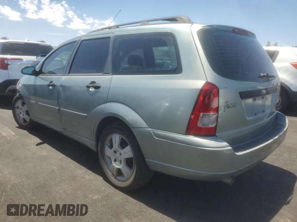 2004 Ford Focus SE with VIN 1FAFP36384W191801, listed as a Copart auction lot 63661465 with 144,226 mi miles and Salvage title. Bid and sale history available at DreamBid. Image 2.