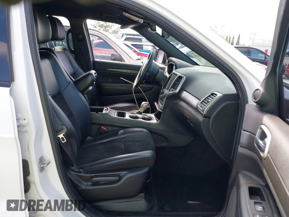2017 Jeep Grand Cherokee Laredo with VIN 1C4RJEAG8HC896166, listed as a IAAI auction lot 41611979 with 67,257 mi miles and . Bid and sale history available at DreamBid. Image 5.