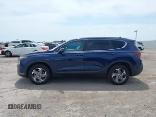 2021 Hyundai Santa Fe SE with VIN 5NMS14AJ2MH339403, listed as a IAAI auction lot 42024896 with 91,734 mi miles and . Bid and sale history available at DreamBid. Image 14.