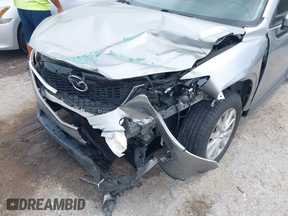 2013 Mazda CX-5 Touring with VIN JM3KE2CE3D0136911, listed as a IAAI auction lot 42095413 with 158,515 mi miles. Bid and sale history available at carsss.com. Image 6.