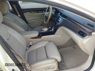 2013 Cadillac XTS Premium z VIN 2G61S5S35D9103948, wystawiony jako IAAI lot #42090444 z przebiegiem 154 728 mil mil oraz . Historia ofert i sprzedaży dostępna na DreamBid. Obrazek 5.