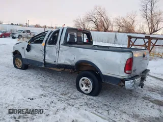 1999 Ford F-150 XL with VIN 1FTRX18LXXNA44916, listed as a IAAI auction lot 41322276 with 1 mi miles. Bid and sale history available at carsss.com. Image 3.