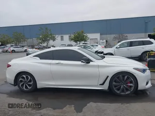 2021 Infiniti Q60 Red Sport 400 with VIN JN1FV7LK1MM530013, listed as a IAAI auction lot 41461752 with 52,844 mi miles and . Bid and sale history available at DreamBid. Image 13.