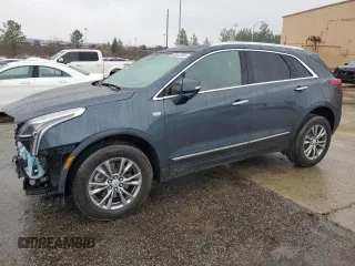 2021 Cadillac XT5 AWD Premium Luxury with VIN 1GYKNDRS4MZ170492, listed as a Copart auction lot 46247055 with 29,557 mi miles and Salvage Title. Bid and sale history available at carsss.com. Image 1.