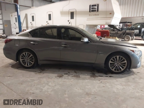 2018 Infiniti Q50 Luxe with VIN JN1EV7AP9JM366158, listed as a IAAI auction lot 41624764 with 76,550 mi miles and . Bid and sale history available at DreamBid. Image 13.