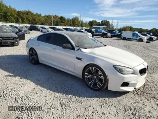 2015 BMW M6 z VIN WBS6C9C58FD467867, wystawiony jako Copart lot #75966844 z przebiegiem 94 102 mil mil oraz Szkoda całkowita • Salvage title. Historia ofert i sprzedaży dostępna na DreamBid. Obrazek 4.