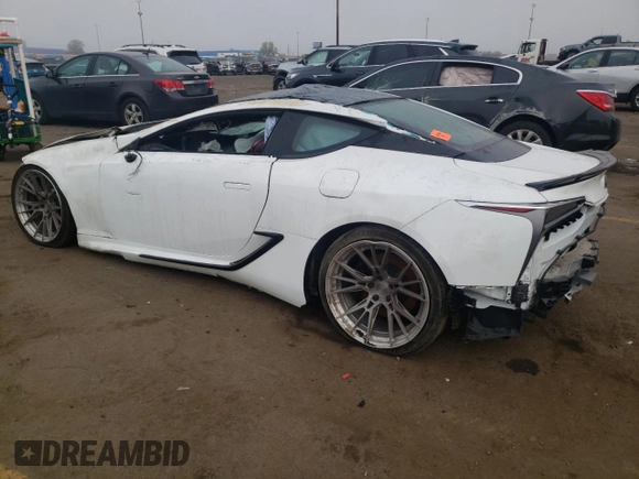 2018 Lexus LC 500h z VIN JTHHP5AY9JA000511, wystawiony jako Copart lot #72041014 z przebiegiem Nie podano mil oraz Szkoda całkowita • Salvage title. Historia ofert i sprzedaży dostępna na DreamBid. Obrazek 2.