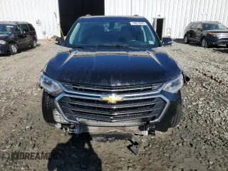 2021 Chevrolet Traverse LT Leather with VIN 1GNEVHKW3MJ196014, listed as a Copart auction lot 49678595 with 124,695 mi miles and Salvage Title. Bid and sale history available at carsss.com. Image 5.