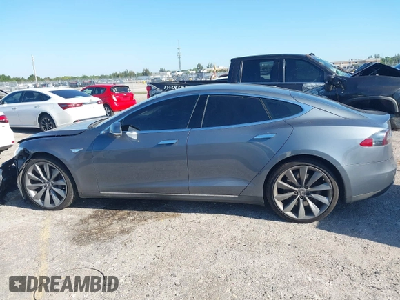 2014 Tesla Model S 60 with VIN 5YJSA1H1XEFP31911, listed as a IAAI auction lot 42029215 with Not Provided miles and . Bid and sale history available at DreamBid. Image 14.