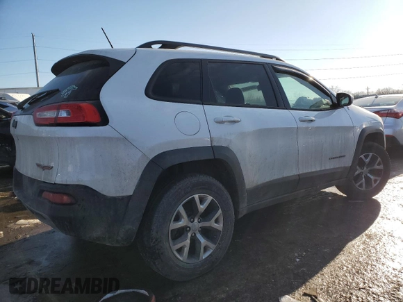 2015 Jeep Cherokee Trailhawk with VIN 1C4PJMBB5FW778883, listed as a Copart auction lot 44444555 with 113,194 mi miles and Salvage title. Bid and sale history available at DreamBid. Image 3.