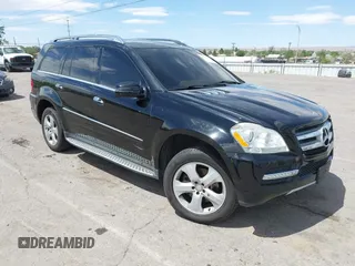 2012 Mercedes-Benz GL 450 z VIN 4JGBF7BE8CA762169, wystawiony jako IAAI lot #42257588 z przebiegiem 148 499 mil mil oraz . Historia ofert i sprzedaży dostępna na DreamBid. Obrazek 1.