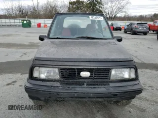 1993 Geo Tracker z VIN 2CNBE18U6P6927170, wystawiony jako Copart lot #48283925 z przebiegiem 178 293 mil mil oraz Tytuł czysty. Historia ofert i sprzedaży dostępna na DreamBid. Obrazek 5.