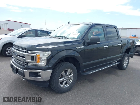 2018 Ford F-150 XL with VIN 1FTEW1EP6JKC24542, listed as a IAAI auction lot 42283242 with 127,608 mi miles and . Bid and sale history available at DreamBid. Image 2.