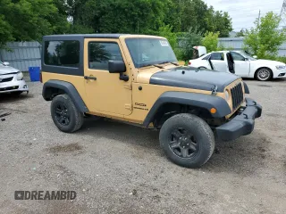2014 Jeep Wrangler Sport with VIN 1C4AJWAG9EL190595, listed as a Copart auction lot 62496955 with 248,484 mi miles and Salvage title. Bid and sale history available at DreamBid. Image 4.