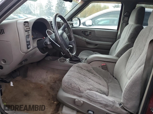1999 GMC Jimmy SLE with VIN 1GKDT13W6X2508118, listed as a Copart auction lot 79761444 with 195,738 mi miles and Salvage Title. Bid and sale history available at carsss.com. Image 7.