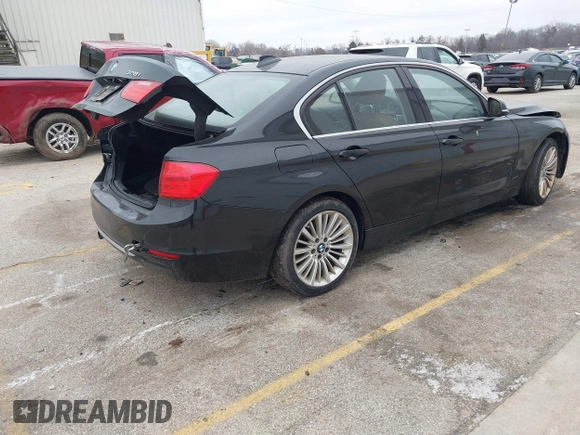 2014 BMW 3 Series 328i xDrive with VIN WBA3B5G56ENS06534, listed as a IAAI auction lot 41549553 with 165,779 mi miles and . Bid and sale history available at DreamBid. Image 4.