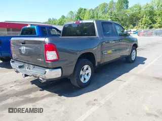 2021 Ram 1500 Big Horn with VIN 1C6SRFFT7MN620668, listed as a IAAI auction lot 42183592 with 74,829 mi miles and . Bid and sale history available at DreamBid. Image 4.