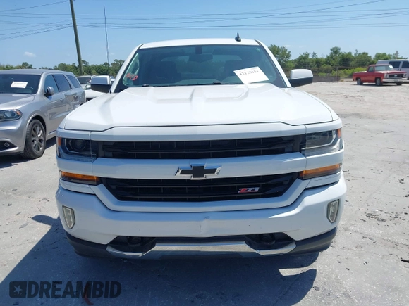 2017 Chevrolet Silverado 1500 LT with VIN 3GCUKREC4HG391101, listed as a IAAI auction lot 42129151 with 84,670 mi miles and . Bid and sale history available at DreamBid. Image 12.