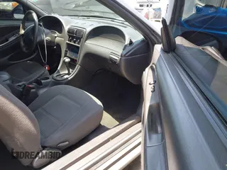 1999 Ford Mustang with VIN 1FAFP4046XF202967, listed as a IAAI auction lot 42574831 with 138,068 mi miles and . Bid and sale history available at DreamBid. Image 5.