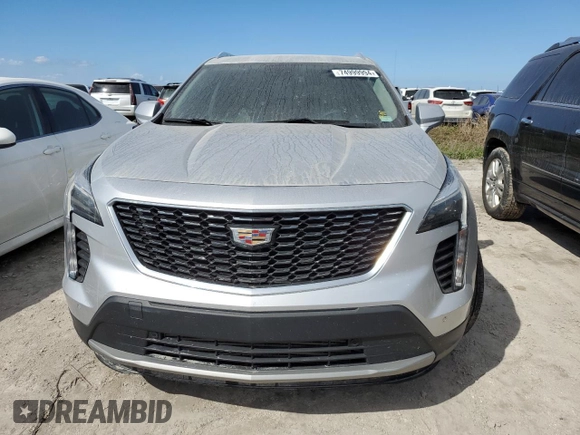 2019 Cadillac XT4 FWD Premium Luxury z VIN 1GYFZCR42KF147440, wystawiony jako Copart lot #45549835 z przebiegiem Nie podano mil oraz Szkody całkowita. Historia ofert i sprzedaży dostępna na DreamBid. Obrazek 5.