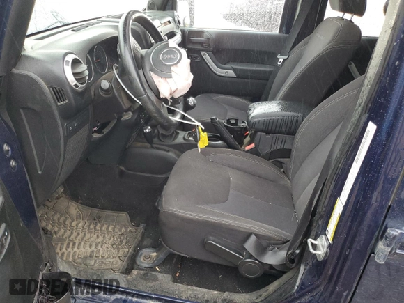 2013 Jeep Wrangler Unlimited Rubicon with VIN 1C4BJWFG5DL572795, listed as a Copart auction lot 62132425 with 149,695 mi miles and Salvage title. Bid and sale history available at DreamBid. Image 7.