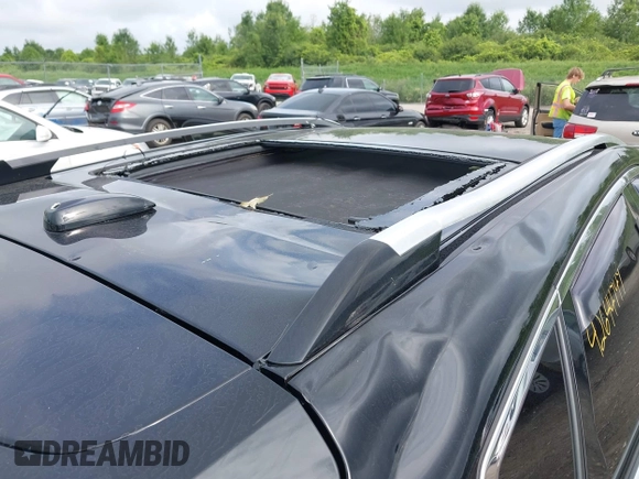 2015 Cadillac SRX Performance Collection with VIN 3GYFNFE35FS591343, listed as a IAAI auction lot 42644949 with 118,718 mi miles and . Bid and sale history available at DreamBid. Image 19.